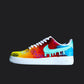 Custom Air Force 1 sneakers with a vibrant color fade from yellow to blue, featuring hexed patterns and a dripping blue Nike swoosh