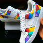 Custom Nike Air Force 1 sneakers with a vibrant mosaic-like pattern of colors, featuring shades of yellow, red, purple, and green on the side and back panels.