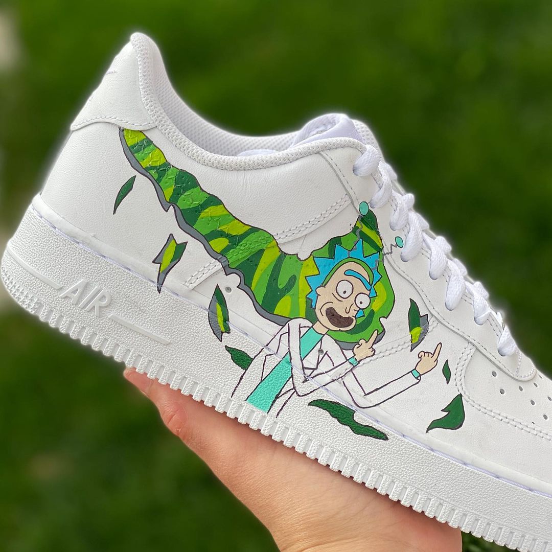 pair of nike air force 1s with a rick themed design based on rick and morty on the side section of the sneaker. 