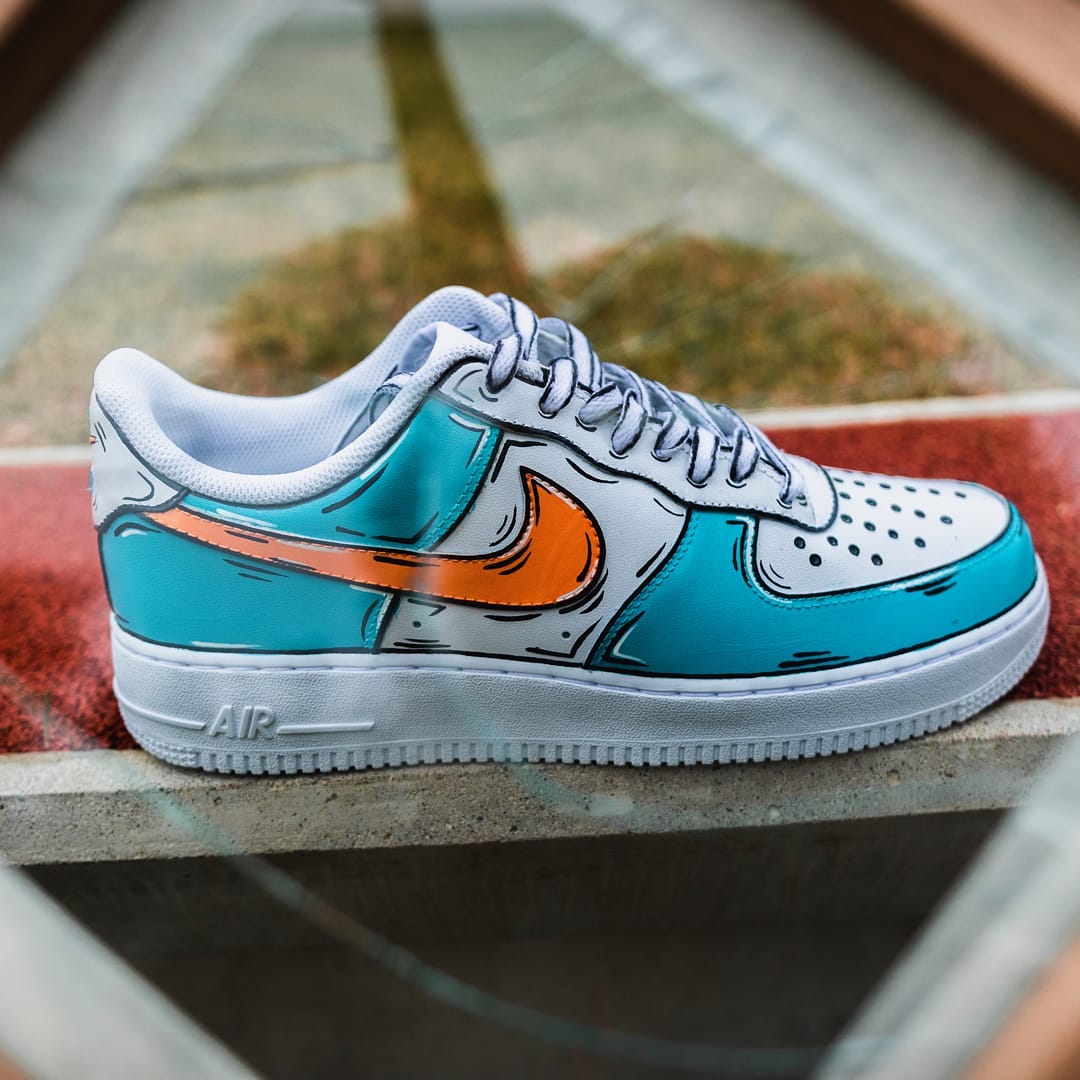 Blue and orange custom Air Force 1s highlighted by unique hand-painted cartoon outlines on panels and laces.