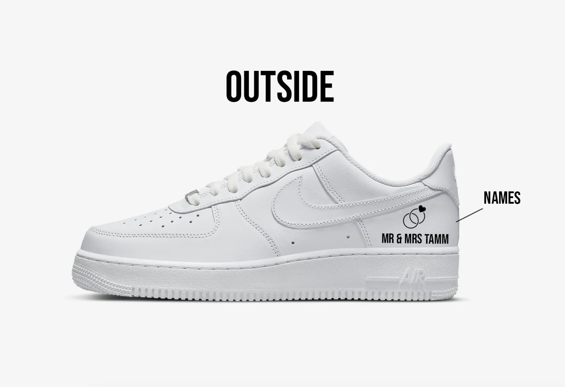 white nike air force 1 sneaker with text MR & MRS Tamm written in black on the back of the sneakers also with a handpainted pair of rings on the  side back of the sneaker