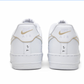 white air force 1 sneakers from back, beige gold, logoand initials on the back heel