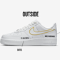 sideview the outer side of nike air force 1 white low model, soowsh outlined in gold, date and name on the side of the sneaker 