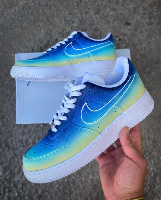 Custom Nike Air Force 1 sneakers with a smooth blue to yellow gradient, creating a vibrant summer-inspired look.