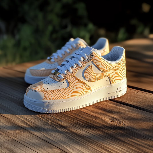Close-up of custom Nike Air Force 1 sneakers with a unique golden fingerprint pattern, hand-painted for a luxury look.