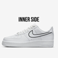 side view of nike air force 1 inner side, nike swoosh logo is outlined in black