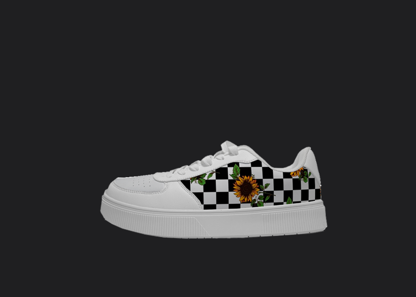 this picture features a white custom sneaker with a checkered black and white pattern with sunflowers. The design covers the entire side of the low white sneakers