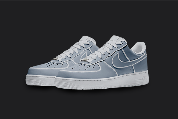 The image is featuring a Custom blue cartoon Air force 1 sneaker pair on a blank black background. The white nike sneakers have a blue cartoon design on the entire air force sneakers. 