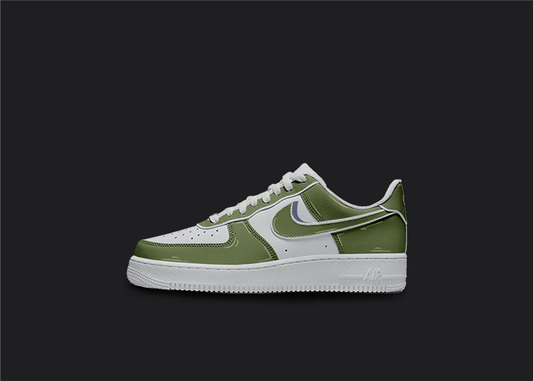 The image is featuring a Custom cartoon Air force 1 sneakers on a blank black background. The white nike sneaker has a green cartoon shadow design on the entire air force sneaker. 