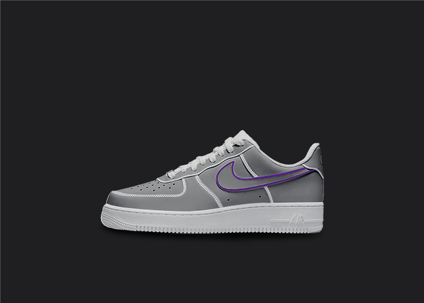 The image is featuring a Custom cartoon Air force 1 sneakers on a blank black background. The white nike sneaker has a black and purple swoosh design on the entire air force sneaker. 