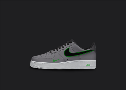 Custom Nike AF1 sneakers in shades of gray and green. The gray base of the shoe features green accents on the Nike logo, base and sole. The hand-painted design adds a unique touch to these one-of-a-kind sneakers.