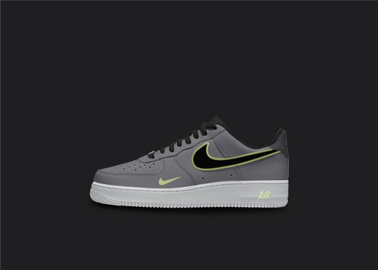 Custom Nike AF1 sneakers in shades of gray and lime. The gray base of the shoe features lime accents on the Nike logo, base and sole. The hand-painted design adds a unique touch to these one-of-a-kind sneakers.