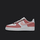 The image is of a Custom Nike Air force 1 sneaker on a blank black background. The custom sneaker are painted in lighter and darker Red tones. 