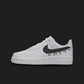 The image is of a Custom Nike Air force 1 sneaker on a blank black background. The white custom sneaker have a black dripping design. 