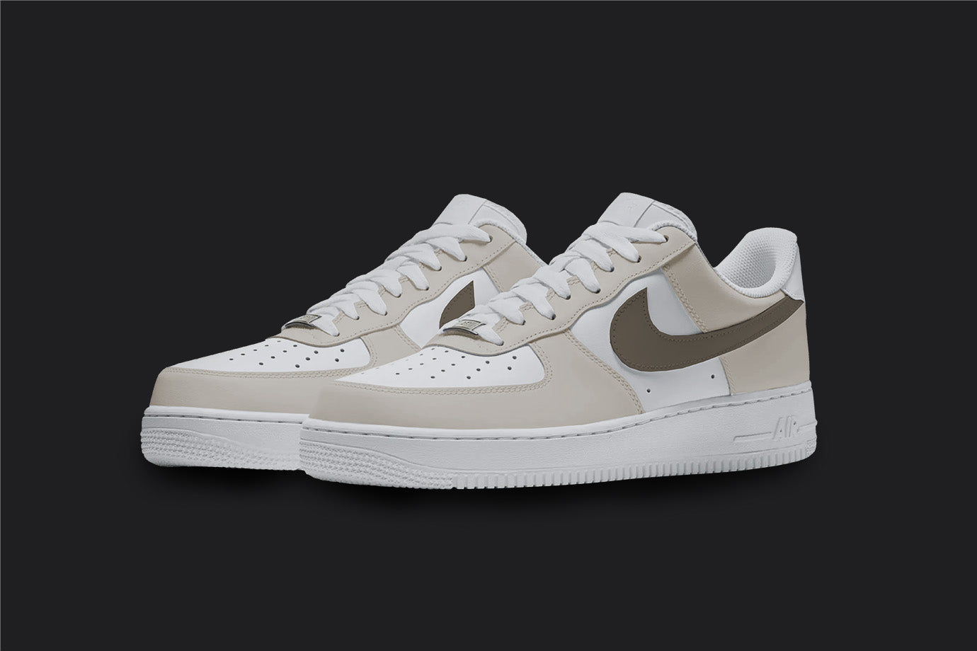 The image is of a Custom Nike Air force 1 sneaker pair on a blank black background. The white custom sneakers have a light brown colorway covering the sneakers. 