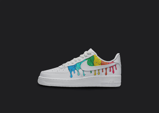 The image is of a Custom Nike Air force 1 sneaker on a blank black background. The white custom sneaker has a colorful dripping design coming from the top of the sneaker.