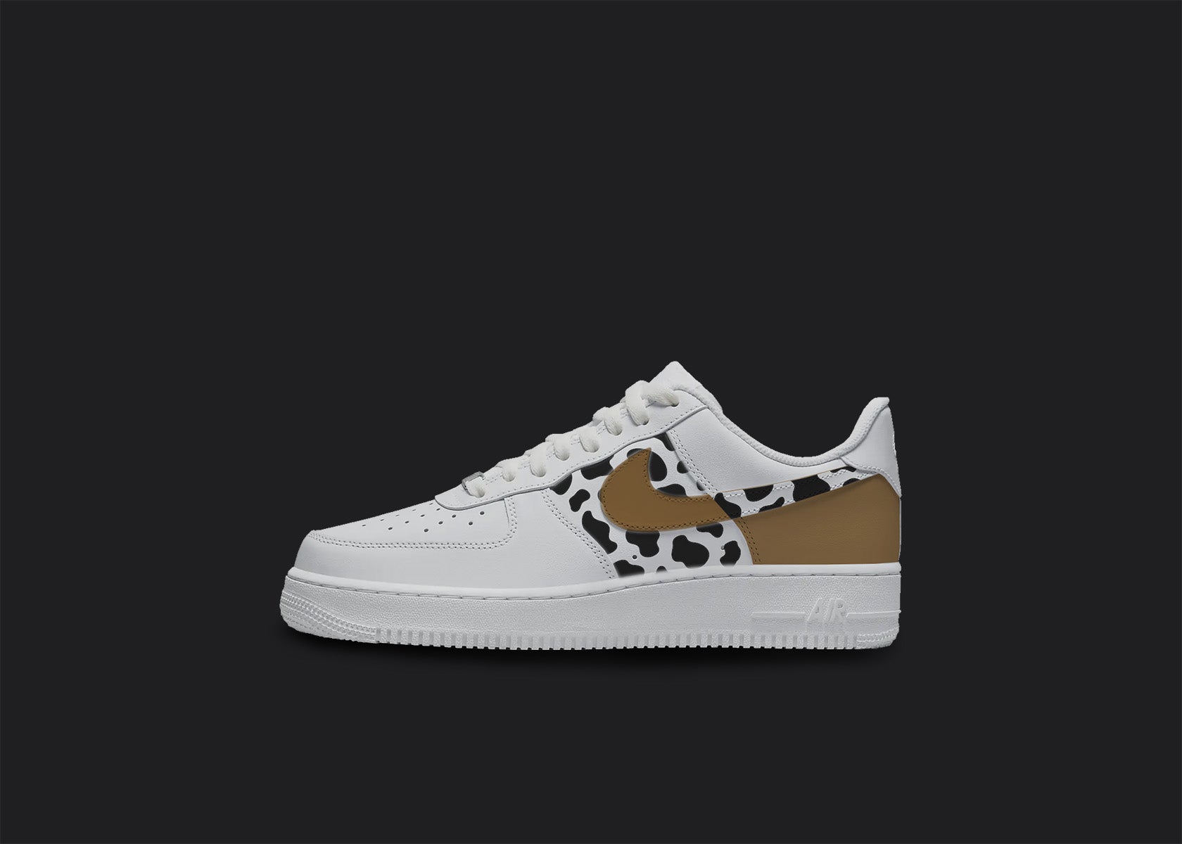 The image is featuring a Custom Nike Air force 1 sneakers on a blank black background. The sections of the custom sneaker are painted in a brown and black cow print.