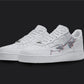 The image is of a Custom Nike Air force 1 sneaker pair on a blank black background. The white custom sneakers have a linart creation of adams hand illustrations on the sides of the sneaker. 