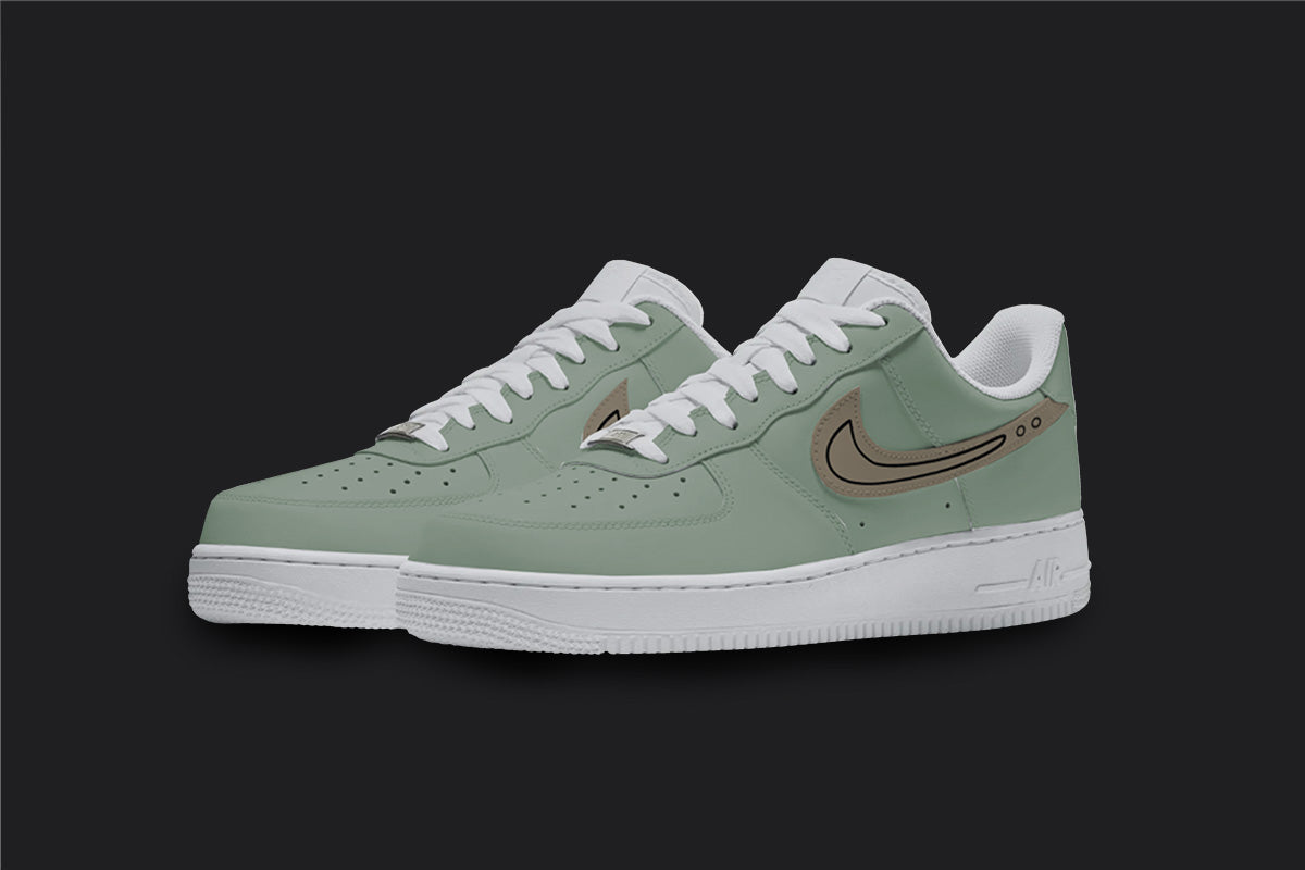 The image is of a Custom Nike Air force 1 sneaker pair on a blank black background. The white custom sneakers have a pastel green and brown colorway covering the nike sneakers.