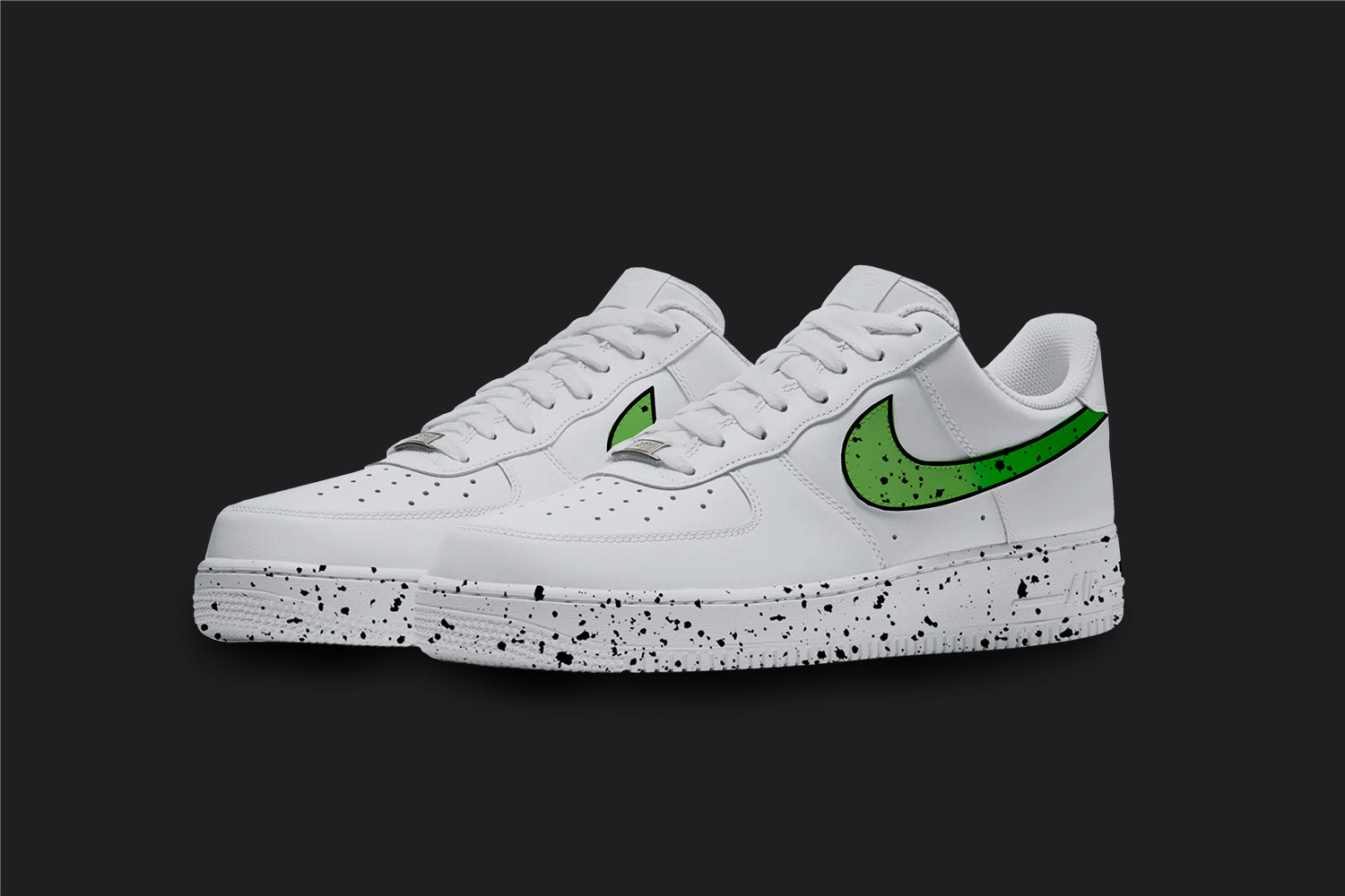 The image is of a Custom Nike Air force 1 sneaker pair on a blank black background. The white custom sneakers have a green splatter covering the sole and the nike logo of the sneakers. Under the splatter the nike logo is made in a Green fade. 