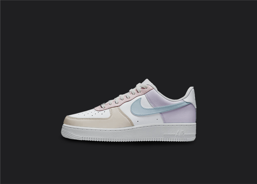 Custom Nike air force 1s are displayed on a dark blank background. The sneakers feature a mix of different custom pastel painted sections. The Nike logo has a blueish tone design, whereas the other parts of the senaekrs feature brown, purple and red pastel tones.