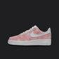 The image is of a Custom Nike Air force 1 sneaker on a blank black background. The white custom nike sneaker has a darker and lighter pink cloud pattern covering the sneaker.