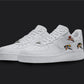 The image is of a Custom Nike Air force 1 sneaker pair on a blank black background. The white custom sneakers have 3 Power Puff Girls on the side of the sneakers.