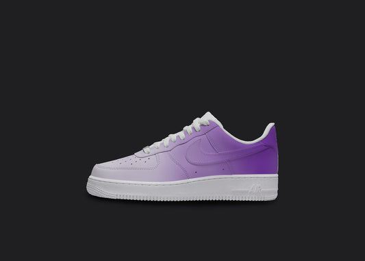 The image is of a Custom Nike Air force 1 sneaker on a blank black background. The white custom nike sneaker has a purple ombre covering the entire sneaker.