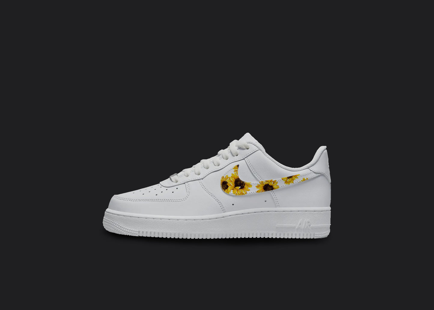 The image is featuring a Custom Nike Air force 1 sneakers on a blank black background. The white nike sneaker has a yellow sunflower swoosh. 