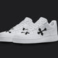 The image is of a Custom Nike Air force 1 sneakers on a blank black background. The custom sneaker pair has black crosses on different part of the white sneakers