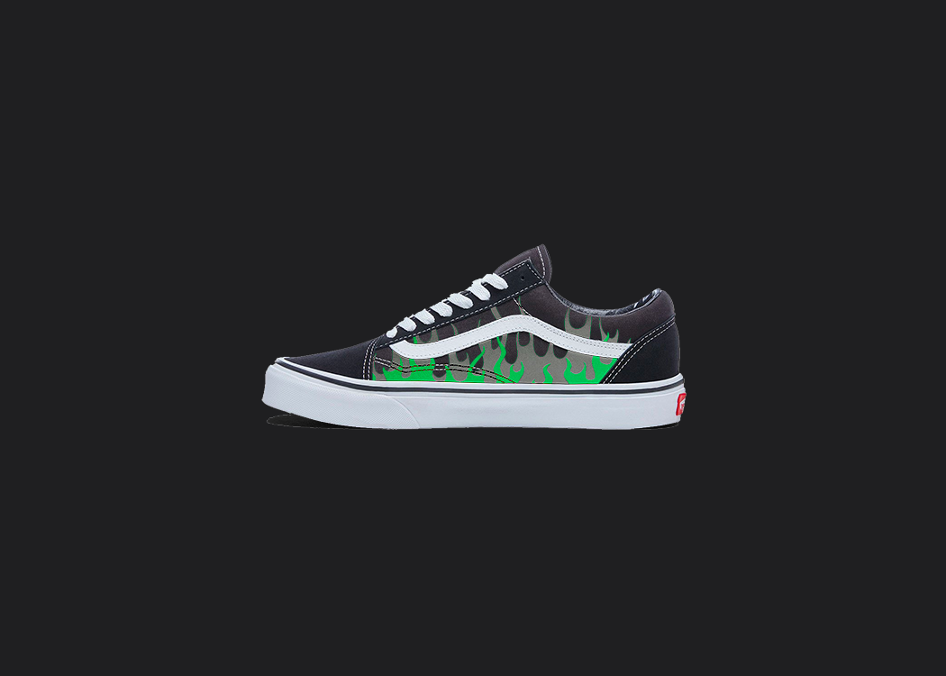 The image is featuring a custom hand painted vans shoes on a blank black background. The vans old skools sneaker has a custom flame design on the side of shoes.