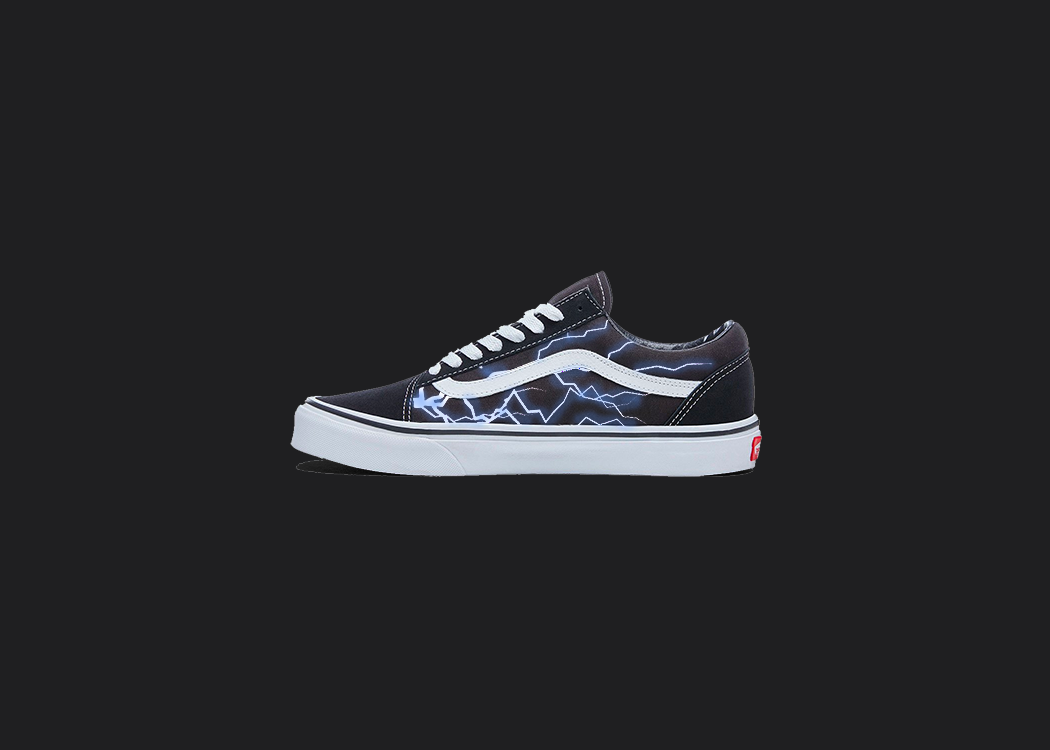 The image is featuring a custom hand painted vans shoes on a blank black background. The vans old skools sneaker has a custom blue lightning design on the side of shoes. 