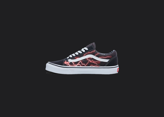 The image is featuring a custom hand painted vans shoes on a blank black background. The vans old skools sneaker has a custom Red lightning design on the side of shoes. 