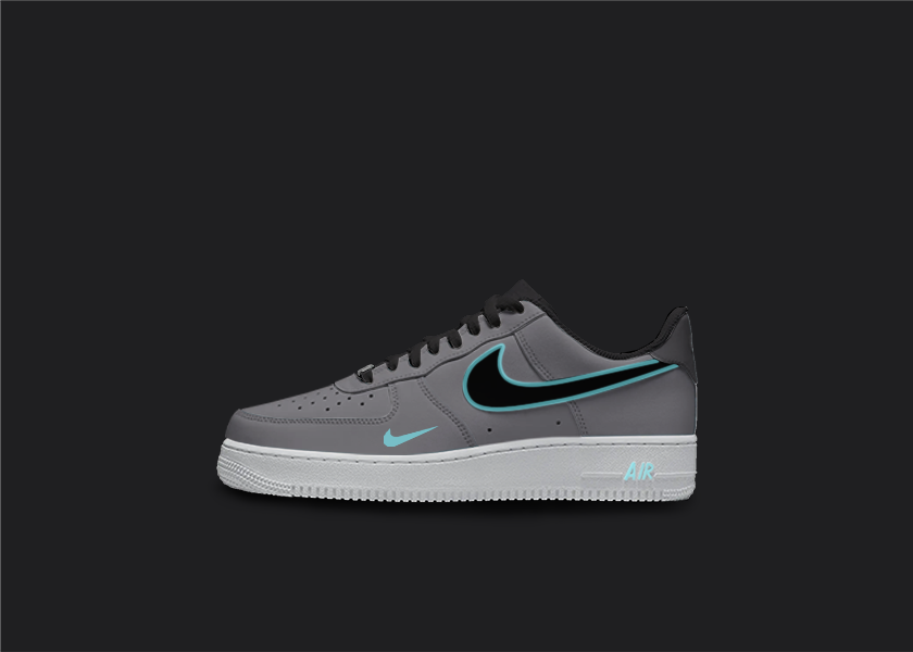 Custom Nike AF1 sneakers in shades of gray and light blue. The gray base of the shoe features light blue accents on the Nike logo, base and sole. The hand-painted design adds a unique touch to these one-of-a-kind sneakers.