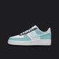 The image is of a Custom Nike Air force 1 sneaker on a blank black background. The custom sneaker are painted in lighter blue and gray colors. 